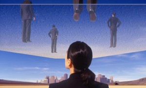 Businesswoman looking at glass ceiling (STEM)