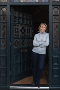 Woman standing in a door way