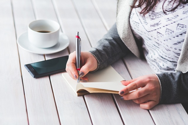 casual woman with coffee and diary, flexible working