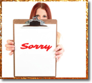 women saying sorry with clipboard