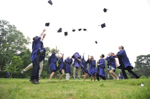 graduate students celebrating their graduation