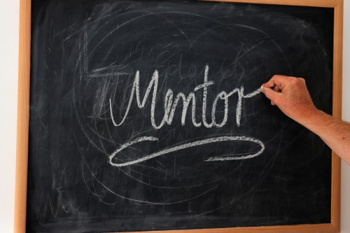 mentor on a chalkboard