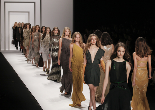 fashion models walking down the catwalk 