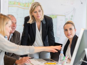 Women owned-business lady telling people what to do