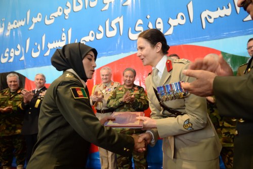 female officer awarding afghan female graduate certificate